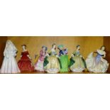 A collection of seven Royal Doulton figurines, 'The Bride' HN2166, 'Elegance' HN2264, (x2), '