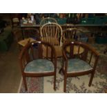 A pair of stripped elm and beech stick-back armchairs, a pair of mahogany padded-seat armchairs, two