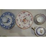 Four late-19th century blue and white plates, 23cm and 27cm, a Chinese tea bowl painted with