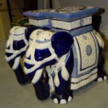 A pair of ceramic elephant garden seats, 44cm high and a pair of modern cloisonné bowls with lids,
