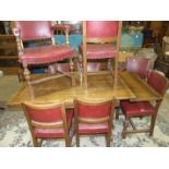 A 20th century oak draw-leaf refectory dining table, 213 x 86cm extended, together with eight dining