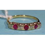 A ruby and diamond ring set four brilliant-cut diamonds and three round-cut rubies, in 18ct gold