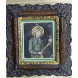 A figure of a Persian nobleman holding a book with a bird on his wrist, mixed media on card, 10 x