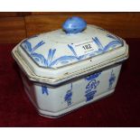 A reproduction Oriental blue and white tureen decorated with a crown above a cipher and pot