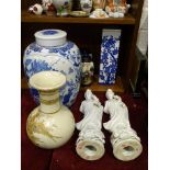 A 20th century Oriental ginger jar and cover with blue and white partridge decoration, 34cm high,