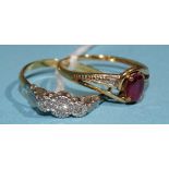 An 18ct gold and platinum ring illusion-set three diamonds, size R, 2.3g and a small ruby and