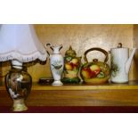 James Skerrett, a bone china teapot and matching pot and cover on stand decorated with fruit, a