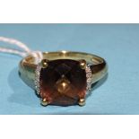 A 9ct gold ring set checkerboard-cut smoky quartz, size P, 3.4g.