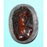 A reproduction Victorian "amber" resin Bakelite carved amber cameo, in oval steel mount, 55 x 41mm.