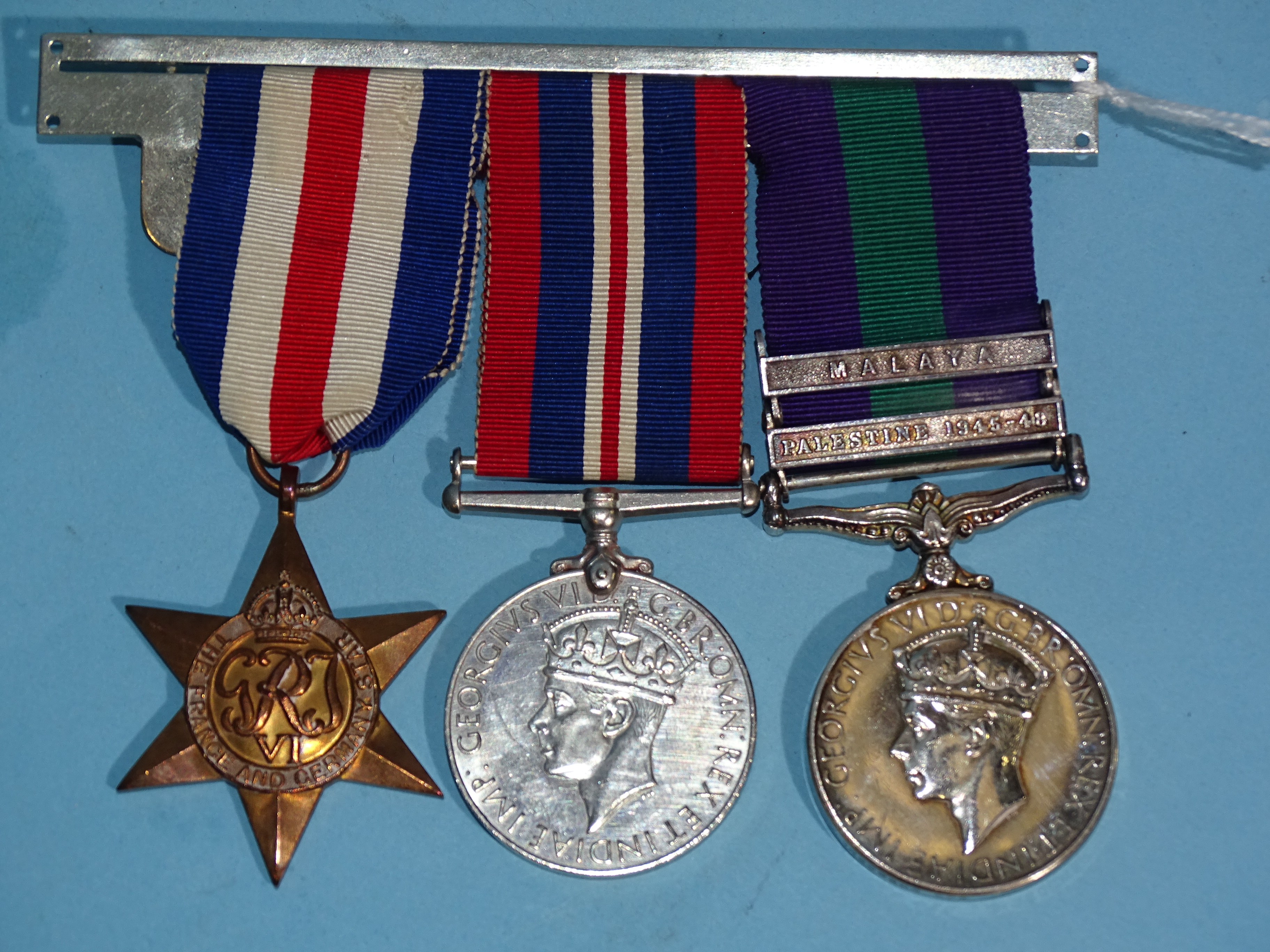 A WWII trio of medals awarded to 14809206 Pte J Stocker KSLI: France and Germany Star, 1939-45 War