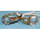 A 9ct gold ring set an aquamarine between diamond-set shoulders, size R, 2.2g and another aquamarine