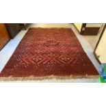 LARGE RED RUG 10'6" X 7'7"