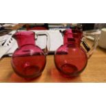 2 CRANBERRY GLASS JUGS