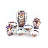 Gold Imari hand painted, vase, pair of covered jars and six rice bowls