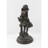 Cast bronze figure of a young woman with a dog in her arms, approx. height 31.5cm