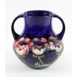 Moorcroft anemone twin-handled vase, blue signature mark to base, 19.5cm high,