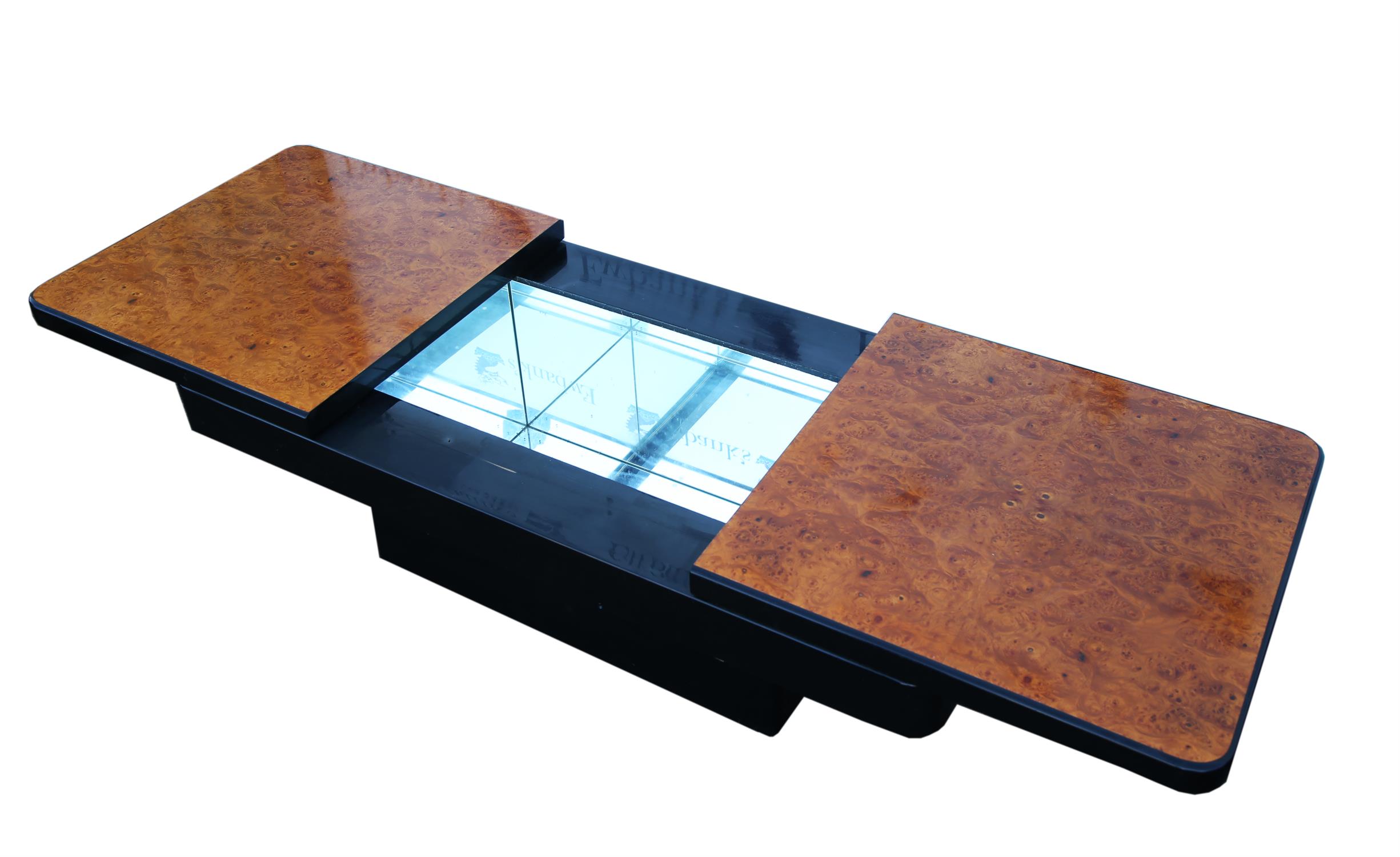 Amboyna and ebonised coffee table, the sliding rectangular top enclosing a mirrored interior, H41, - Image 2 of 2