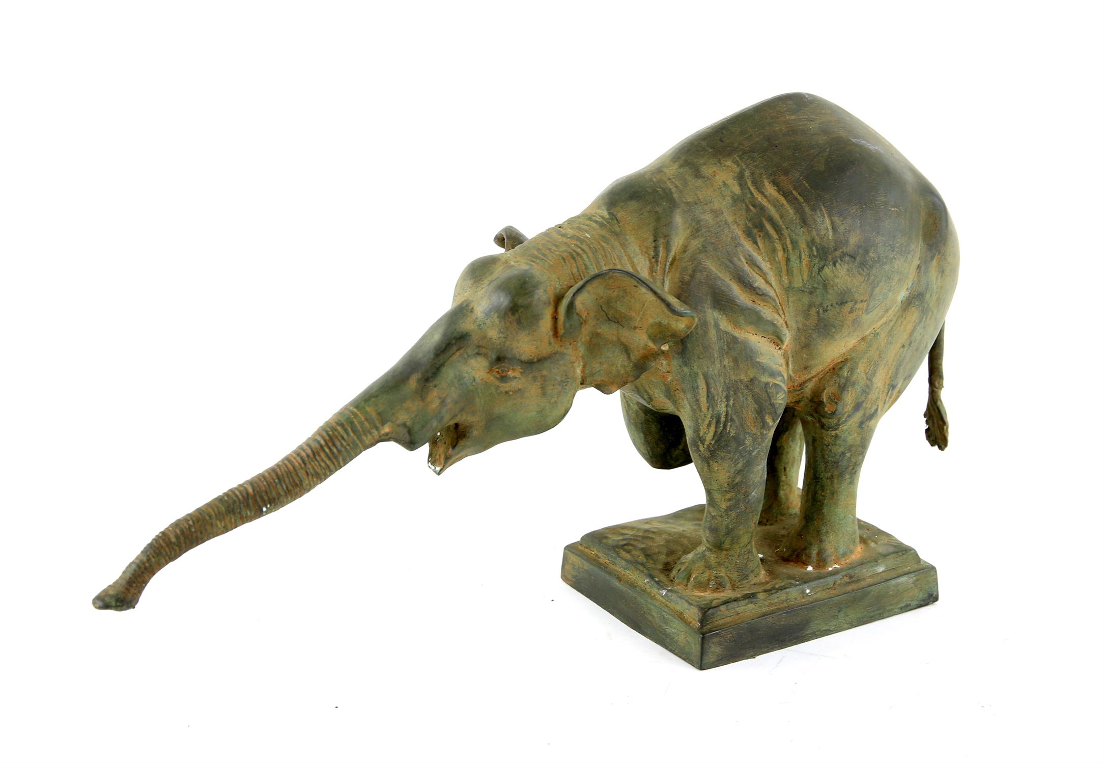 After Rembrandt Bugatti, "Begging Elephant (1908)" bronze casting with green patination,