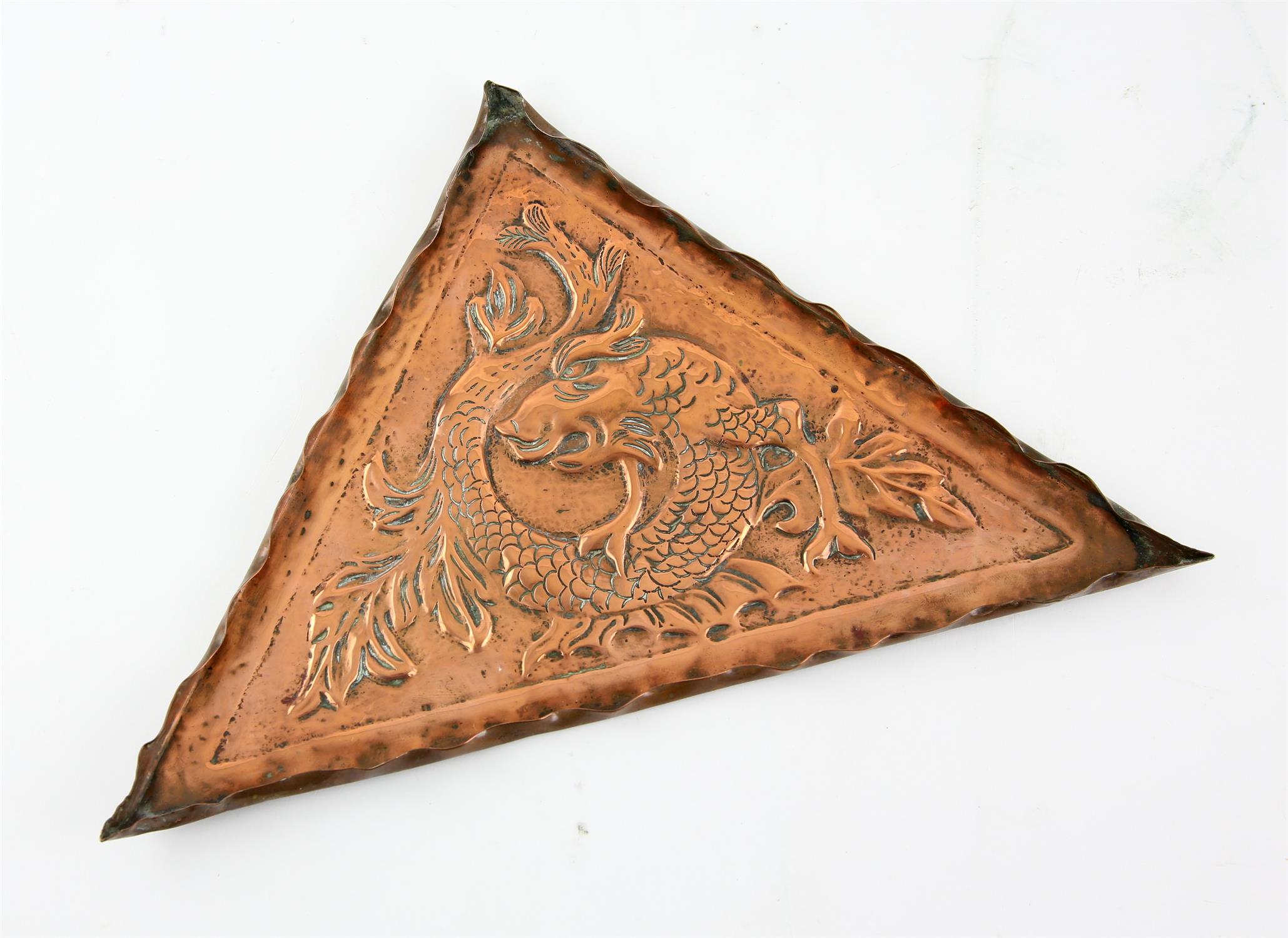 Triangular Arts and Crafts copper card tray embossed with a sea monster 30cm x 24cm