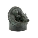 § Elena Engelsen (Norwegian, b. 1952), bronze sculpture in the form of a coiled alligator.