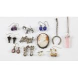 A mixed group of costume jewellery including some silver earrings, a matching brooch and earring
