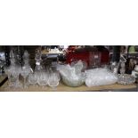 Six cut glass decanters, wine glasses and brandy bowls, and other glass bowls and vases