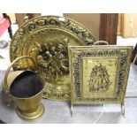 Helmet shaped coal scuttle, chased with a floral design, 47 cm high, two other coal buckets,