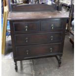 1930s oak chest of drawers, with beaded edges, the raised back over two short and two long