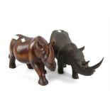 Two African hardwood carvings of rhinoceros approx. L38cm