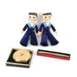 Two Norah Wellings style Queen Mary jollyboy dolls, compact and pen