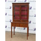 Early 20th century rosewood crossbanded and line inlaid cabinet on stand with glazed doors