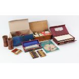 A set of bone and ivory dominos, a miniature set of dominos in a tortoiseshell case,