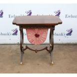 20th century stained oak work table with shaped top, sliding bag under on lyre end supports.