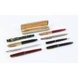 Collection of fountain pens and pencils, including a silver ballpoint pen (initialled),