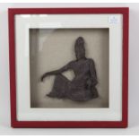 Thai seated figure wall mount, later framed, believed to be bronze, frame 41.5 cm square,