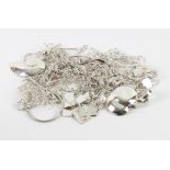 A collection of mainly silver jewellery, including chains, earring pendants, bracelets, coin mount,