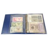 Album of world bank notes from a variety of countries