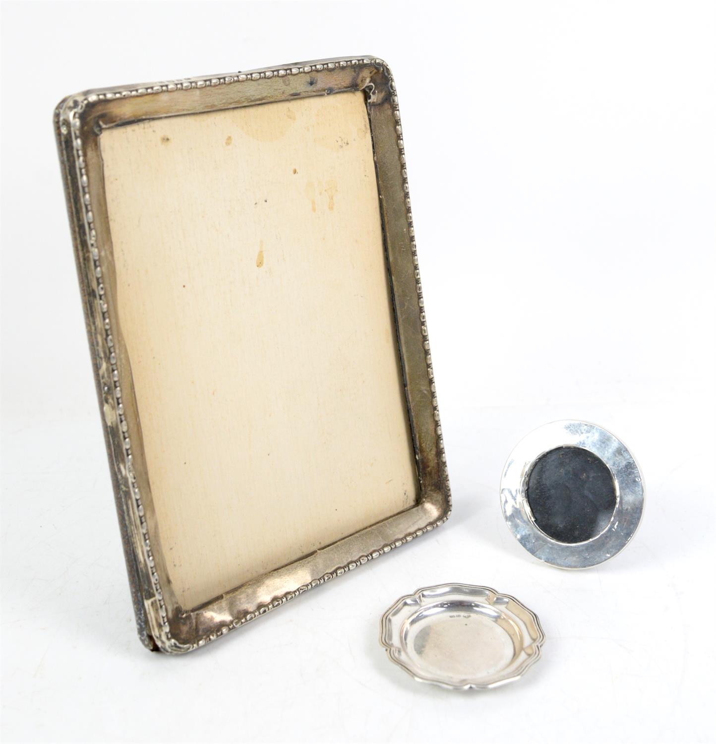 Large silver photo frame Birmingham 1913 a small round photo frame Chester 1924 and an 800 grade