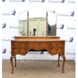 20th century walnut and crossbanded dressing table with triple mirror over five drawers on carved