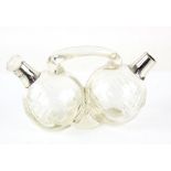 Mappin and Webb silver collared bulbous bodied oil pourer with cut glass design to body by J G and