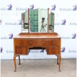 20th century walnut dressing table with triple mirror over four drawers on carved cabriole legs,