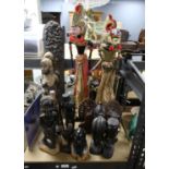 Two Indonesian Wayang Golek (rod puppets) 64cm, and a collection of mainly African hardwood