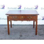 Early 19th century mahogany side table, with crossbanded frieze drawer on square chamfered reduced