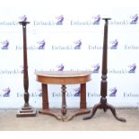 Mahogany torchere stand with reeded column on tripod feet, H147.5 cm, another similar with stepped