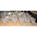 Matched set of graduated square cut wine glasses, with square bases, largest 14.5 cm high