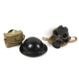 Black tin air raid helmet, a World War II gas mask and cartridge case (3)