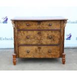 French burr walnut commode, the shaped top over three graduated drawers on later turned feet,