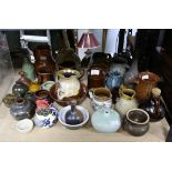 Various small stoneware vases, jugs, and other vessels, Oriental and European.