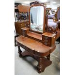 Late Victorian mahogany dressing table, the mirror over a shaped box and trinket drawers over a