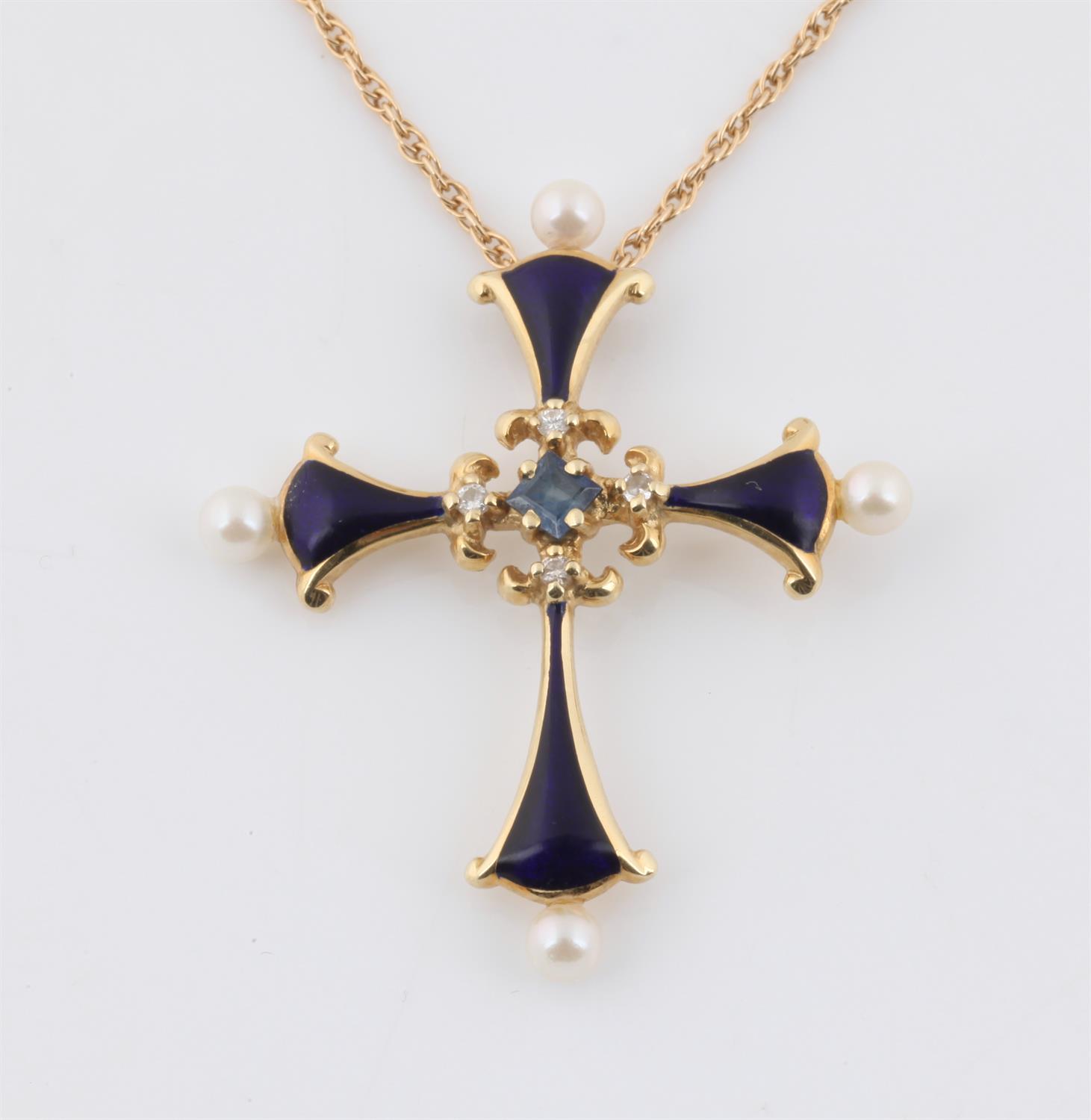 A 'Midnight Sapphire Cross' from The House of Igor Carl Faberge for Franklin Mint,